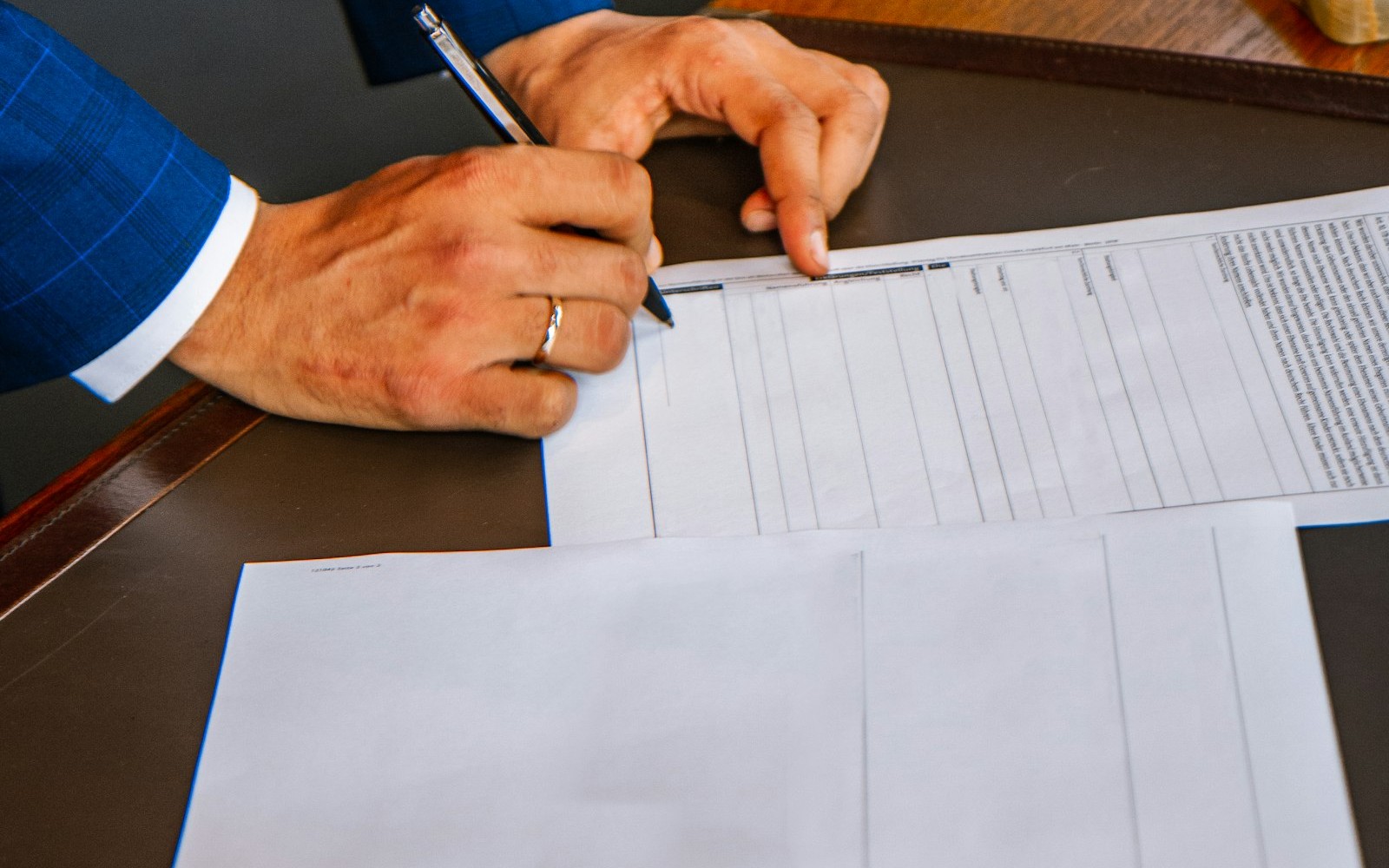 Signing a transfer or cheque form